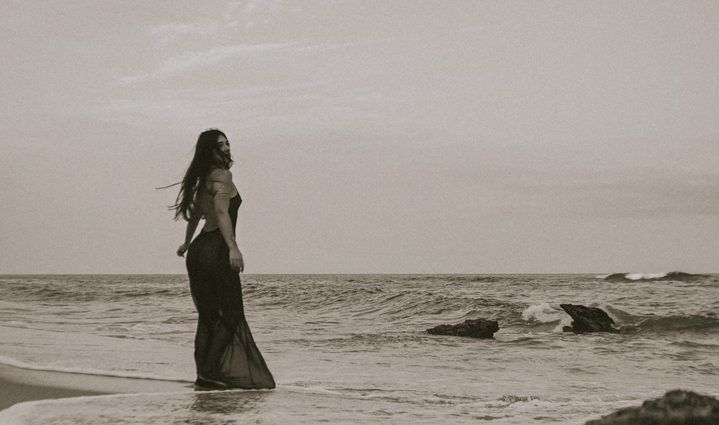 Jo Guerreiro, Somatic Sexologist, in a serene natural setting representing embodied wellness and connection